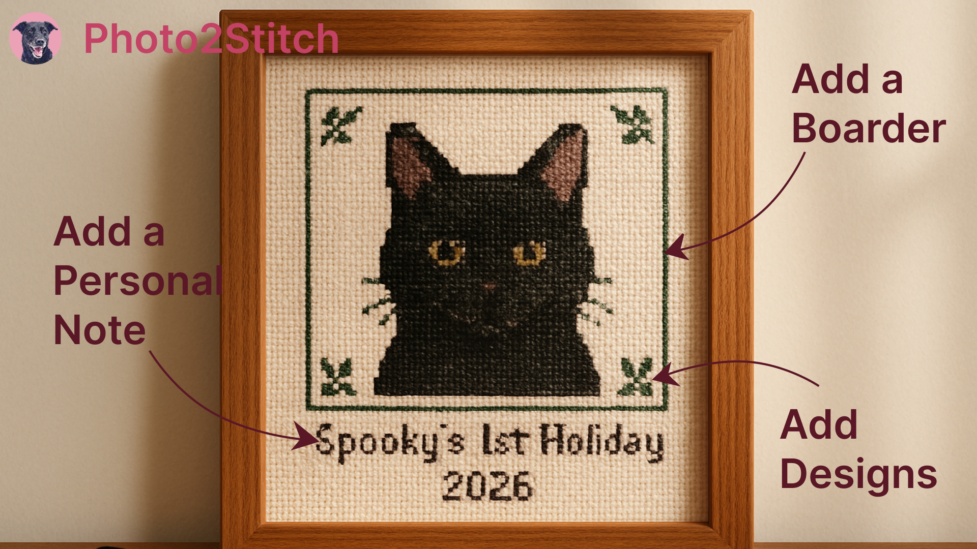 A framed cross stitch portrait of a golden retriever with a stitched border and the name "Buddy 2026" below it, hanging on a warm wall
